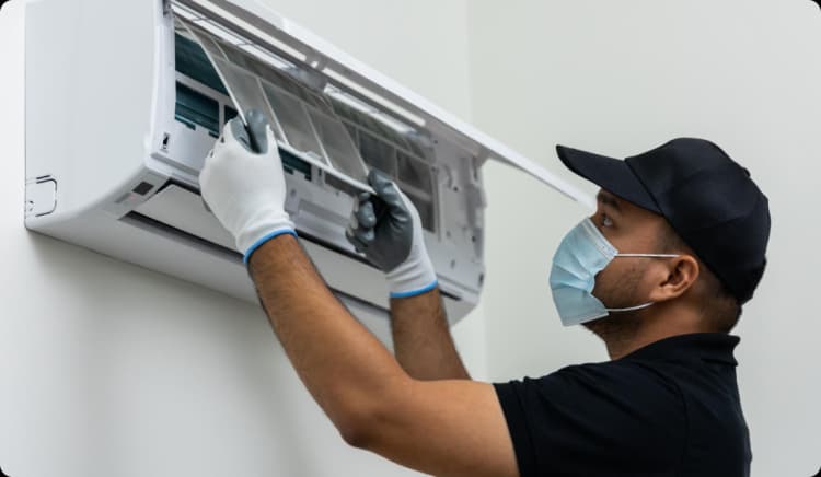 Split AC unit in a Dubai home being serviced